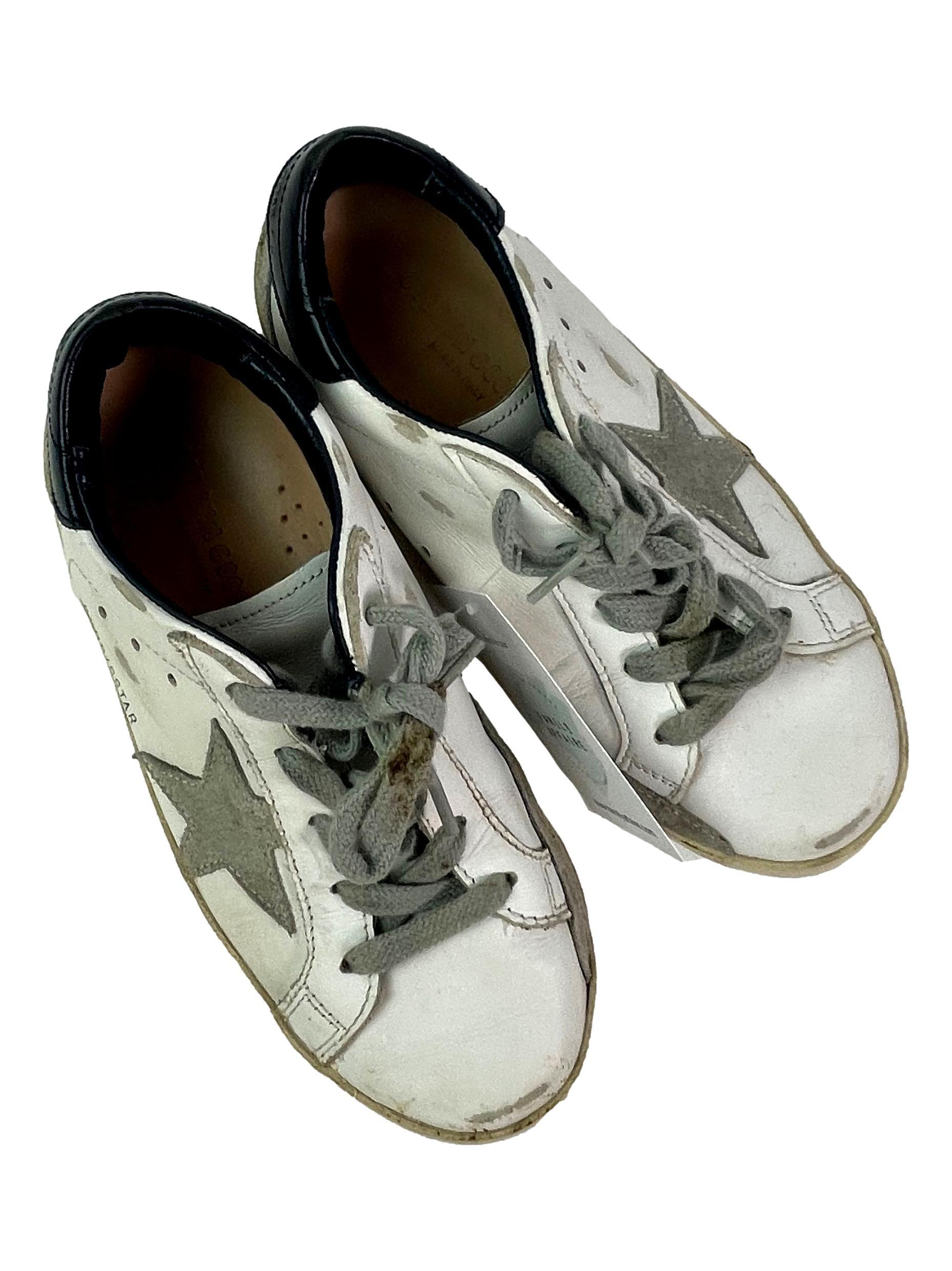 GOLDEN GOOSE P32 Baskets blanches étoile grise